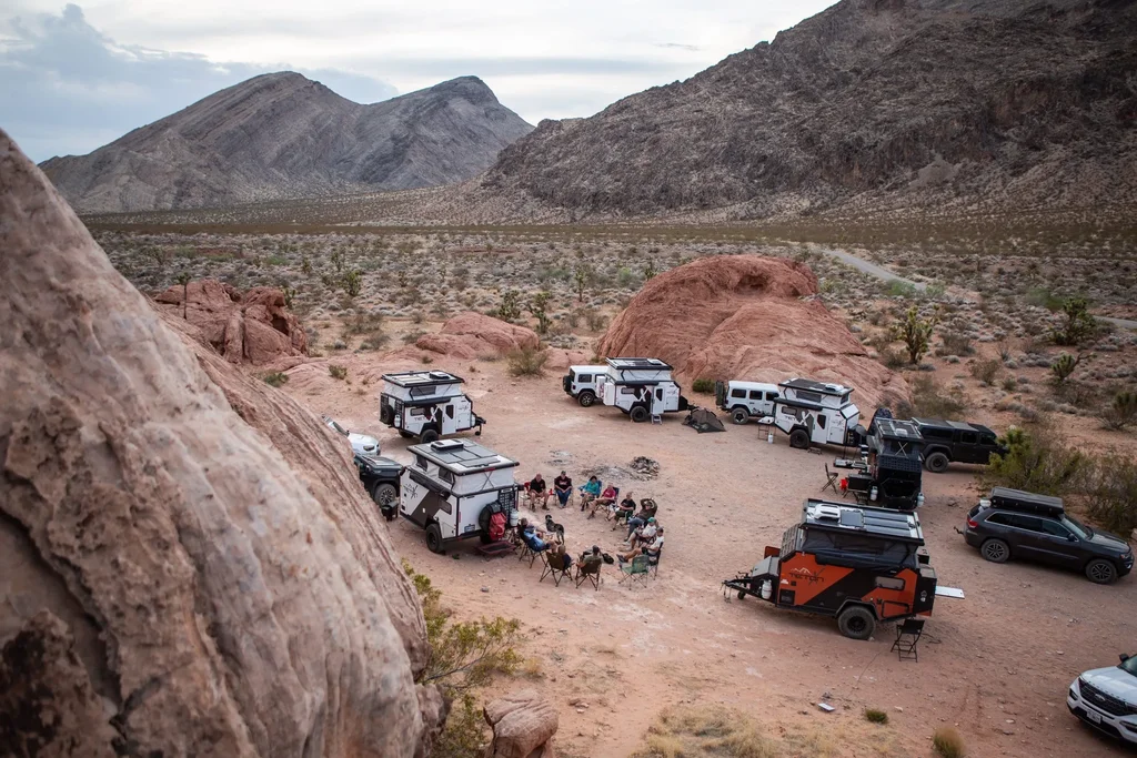 Group of trailers camping in the desert on an overlanding adventure.