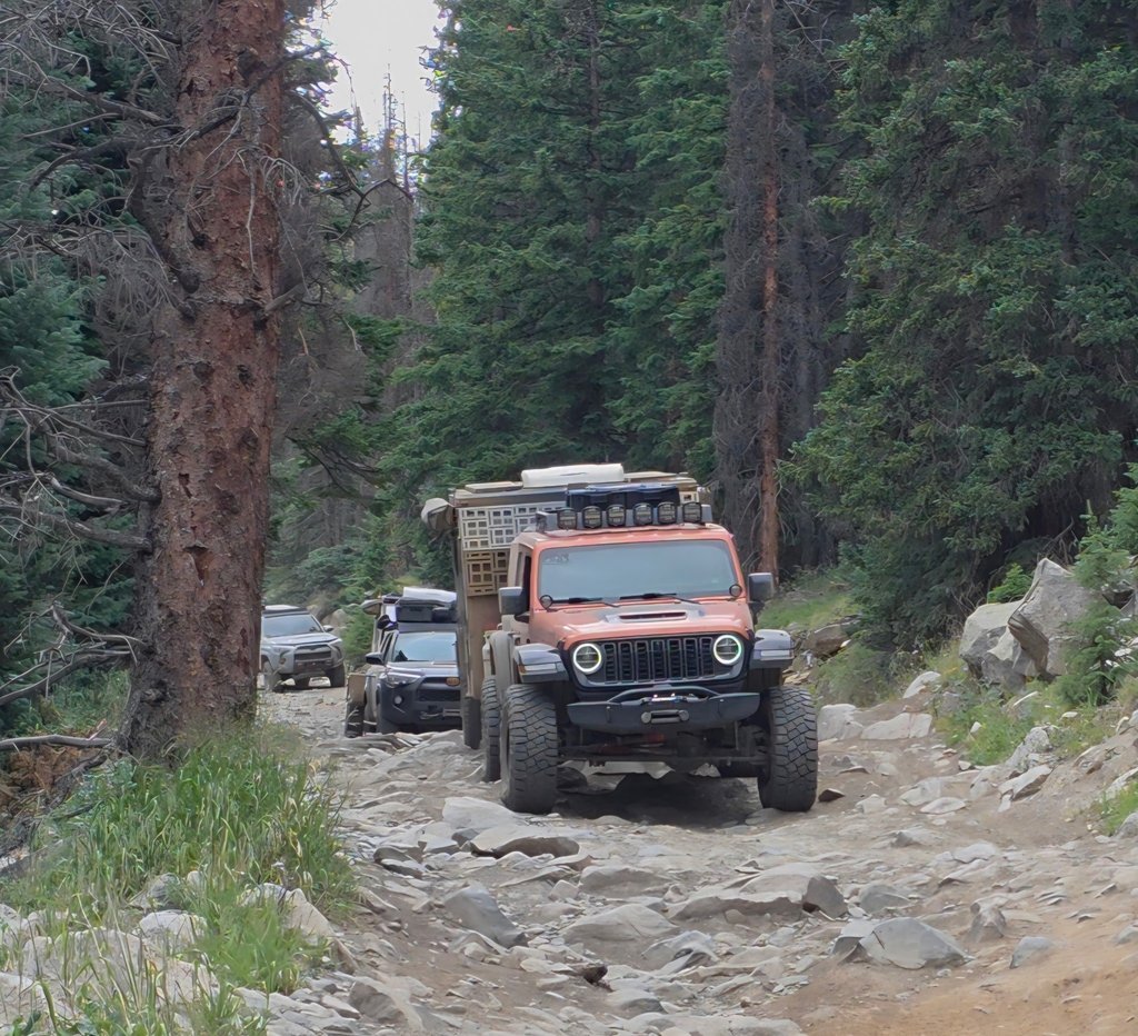 Rough trail pulling camper.